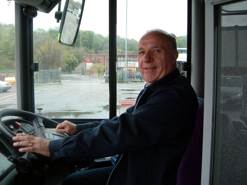 First bus driver Barrie Sheedy, pictured at the wheel after coming last in Sheffield's half marathon for five years running