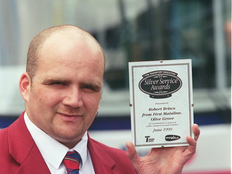 Bus driver Bob Briscoe, from Chapeltown, pictured at Pond Street after receiving his award from the Transport Executive