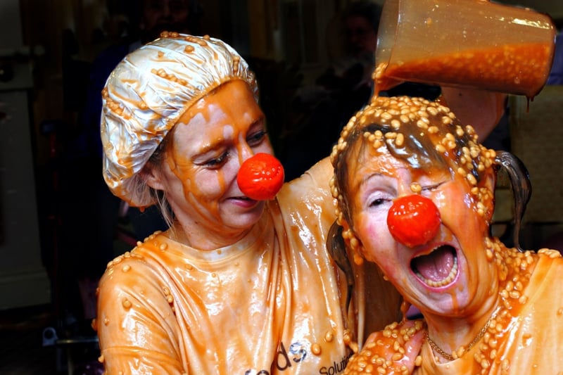 Angela Cornell and Mary Jones had a bath of beans for Comic Relief at the Grangewood Care Centre, Shiney Row in 2011.