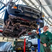 We have put together a gallery of 14 mechanics and garage businesses highly rated by over 100 Google reviews each. File picture shows a mechanic at work