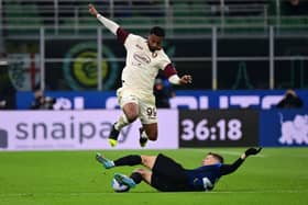 Lys Mousset (L) fights for the ball with Inter Milan's Italian midfielder Nicolo Barella (R) during the Italian Serie A football match between Inter Milan and Salernitana at the Giuseppe Meazza Stadium (also called San Siro), in Milan, on March 4, 2022. (Photo by MIGUEL MEDINA / AFP) (Photo by MIGUEL MEDINA/AFP via Getty Images)