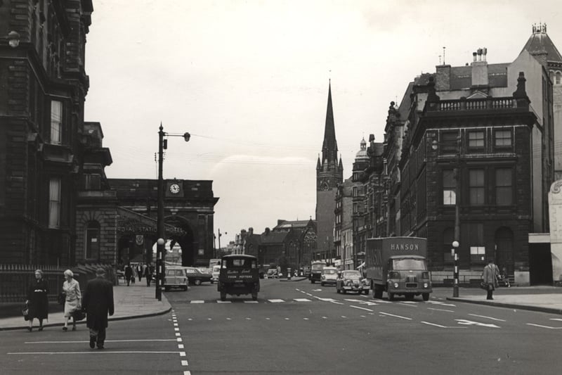 A view of Neville Street taken from Collingwood Street. The Central Station and St. Mary's Cathedral can be seen in the distance.