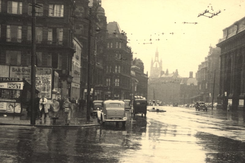 A view of Neville Street Newcastle upon Tyne taken in c.1952. The photograph is looking along Neville Street. Bewick Street is in the foreground to the left and the Central Station to the right. The County Hotel is in the centre left with the Douglas Hotel beyond.