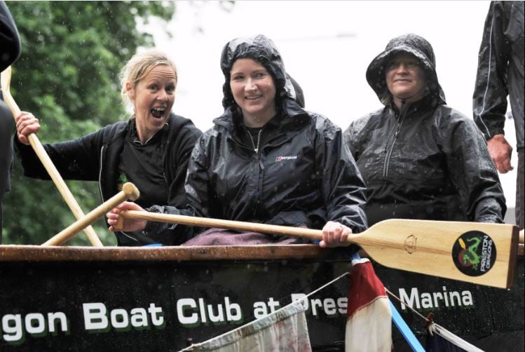 Members of the Dragon Boat Club brave the rain for the annual Penwortham Gala.