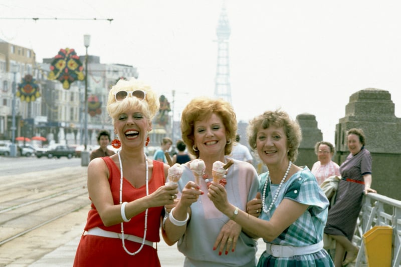 Coronation Street: 1985
Bet Lynch (Julie Goodyear), Rita Fairclough ( Barbara Knox) and Mavis Riley (Thelma Barlow in Blackpool eating ice-cream.