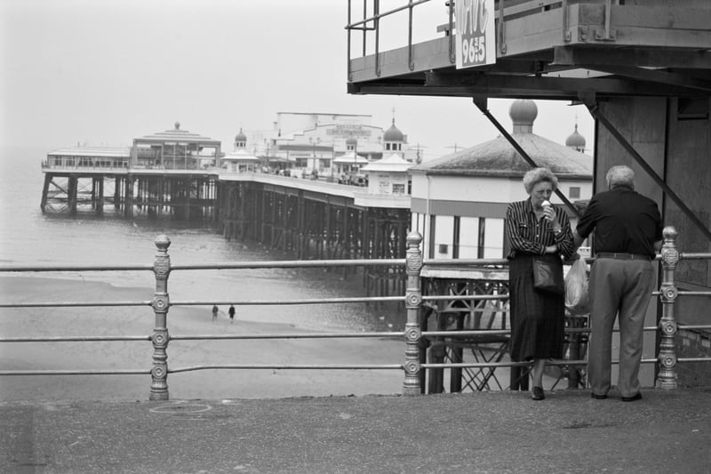An elderly couple photographed by the pier at the end of September in 1998