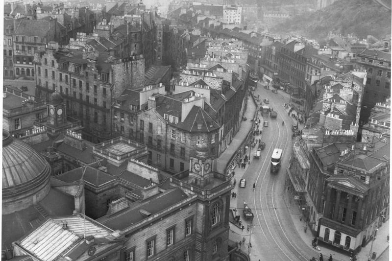 This photo from the 1940s shows a tram going down and a horse and cart going up Leith Street at the site where St James Quarter now stands.