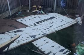 Roofing which was torn off a row of maisonettes on Haslam Crescent in Lowedges, Sheffield, during Storm Jocelyn and landed in Kerrie Ibbotson's garden, smashing her children's swing