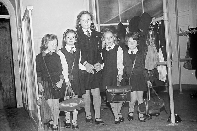 Pupils leave their coats in the cloakroom on the first day of a new session at Mary Erskine primary school in 1964.