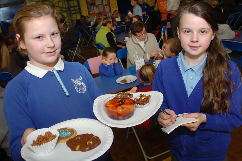 Jenny Lincoln and Maycey Cairns served parents with Fair Trade produce they made in 2012.