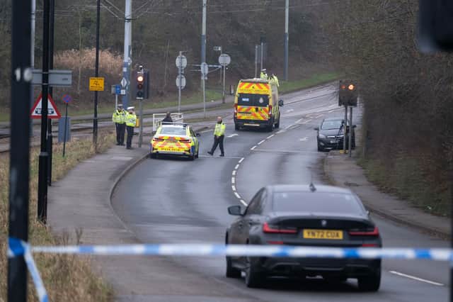 Police on the scene of the serious collision at Donetsk Way in Sheffield, which has left a woman fighting for her life
