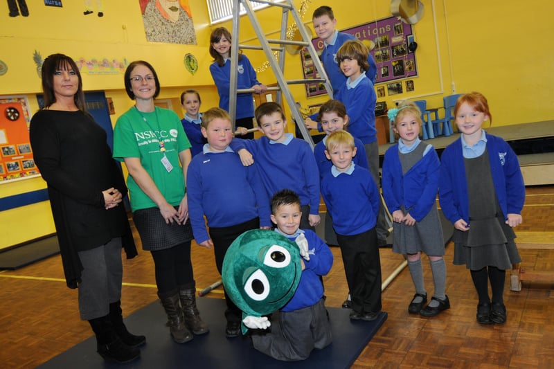 Children at the school tackled an obstacle course for charity in 2012.
Here they are with NSPCC schools organiser Deborah Liddle, second left,  and teacher Suzanne Gilley.
