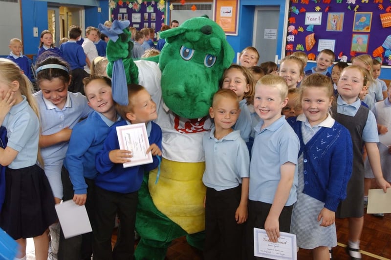 Cedric The Dragon was the welcome visitor to the school in this scene from July 2003.