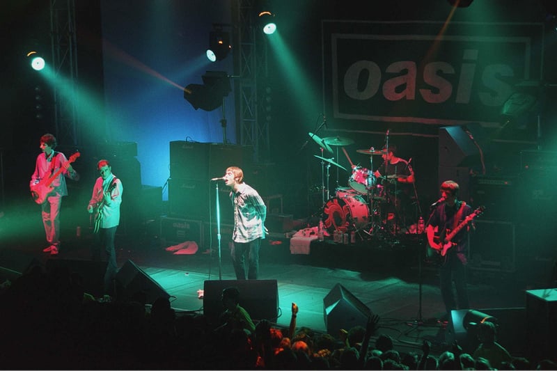 Oasis performing in Blackpool, 1995