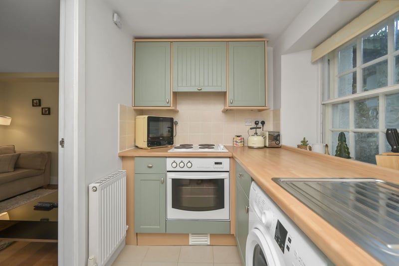 The kitchen has a good range of fitted units, appliances and a window to the front of the property. 