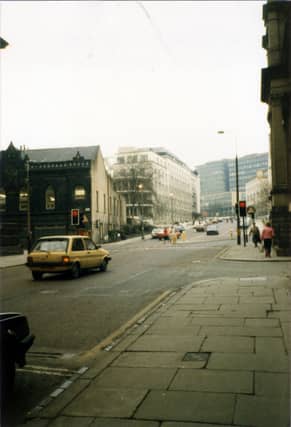 Looking north up Calverley Street showing the junction with Alexander Street on the right. Just beyond this, the edge of the Education Offices can be seen. In the background are the Brotherton Wing of Leeds General Infirmary and buildings of Leeds Polytechnic.