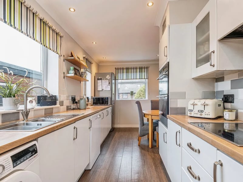 The home features a beautiful and spacious kitchen with lots of work space and a range of modern appliances.