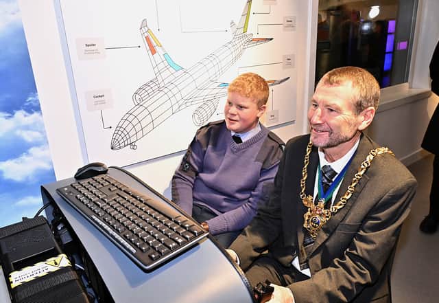 Lord Mayor of Sheffield Colin Ross takes a spin on the new filght simulator along with an air cadet from Sheffield's 362 Squadron.