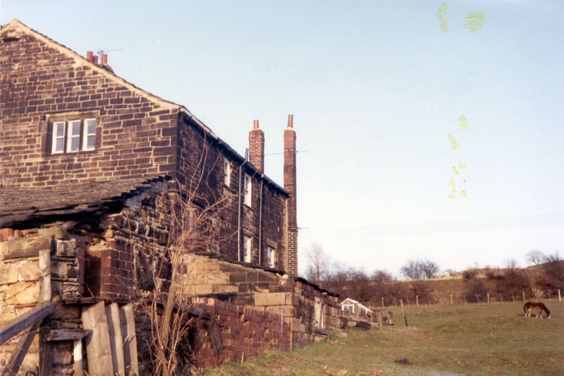 Stank Hall on Dewsbury Road pictured in 1983. This farmhouse dates back to at least 1609 when it was purchased by Christopher Hodgson, though it is part of a farm that is much older, with a barn built possibly as far back as 1448 (from tree-ring dating). Some elements of an earlier timber-framed building which may date from the same time still survive in the brick walls of the Hall. Now a listed building, it was still in use as a farmhouse until the 1960s.