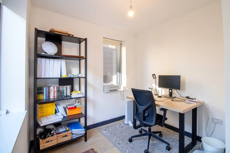 On the first floor are two additional bedrooms, which can be used as office space.