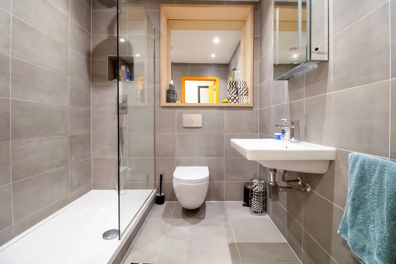 On the first floor is a shower room with a large luxurious walk-in shower.