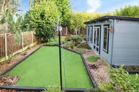 The back garden of the three-bedroom semi-detached house on Follett Road, Sheffield, which is for sale with an asking price of £180,000