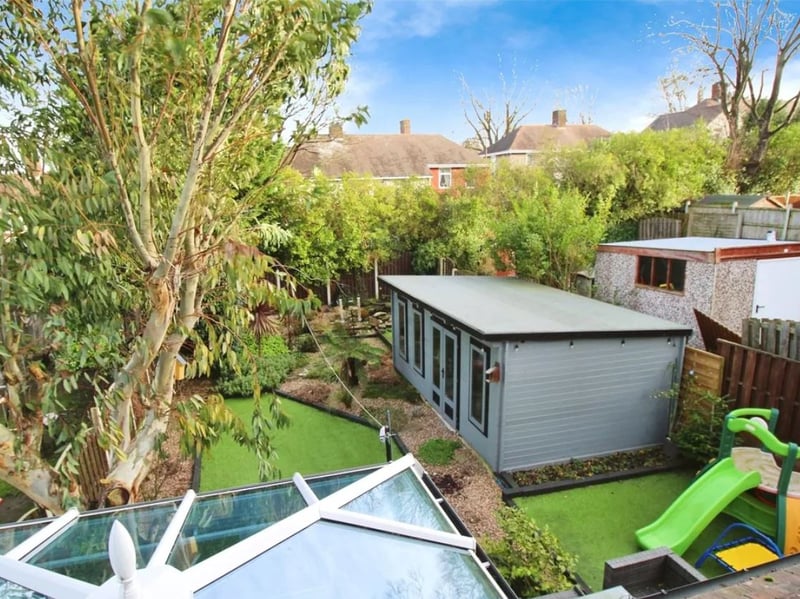 Looking down upon the garden and summer house at the three-bedroom semi-detached house on Follett Road, Sheffield, which is for sale with an asking price of £180,000