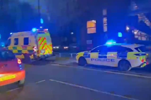 Emergency services at the scene of a stabbing on Sharrow Lane, Sheffield, which has left an 18-year-old man in hospital in a serious condition