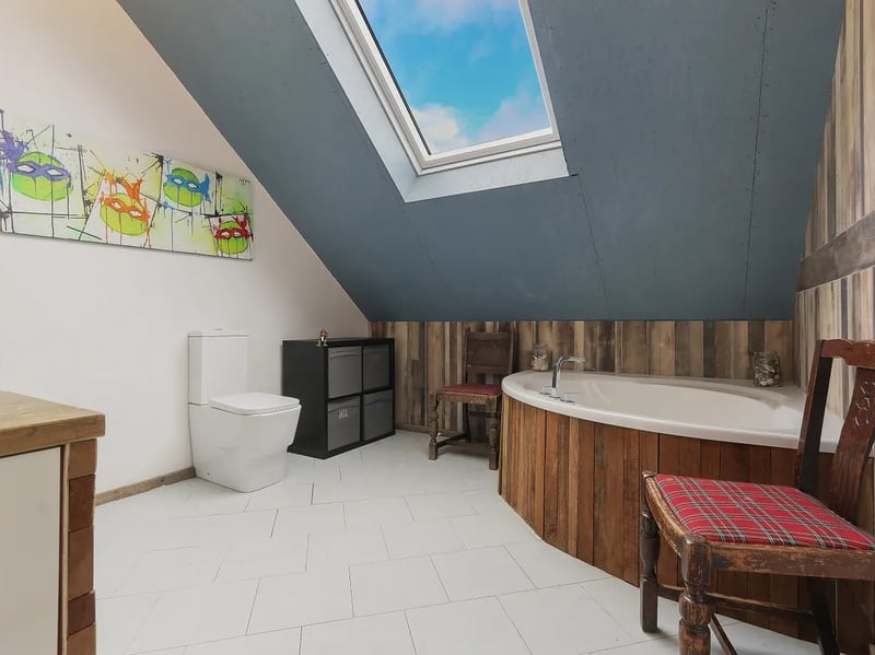 There are a whopping three bathrooms in this house. This one is found amongst the bedrooms on the second floor. (Photo courtesy of Zoopla)