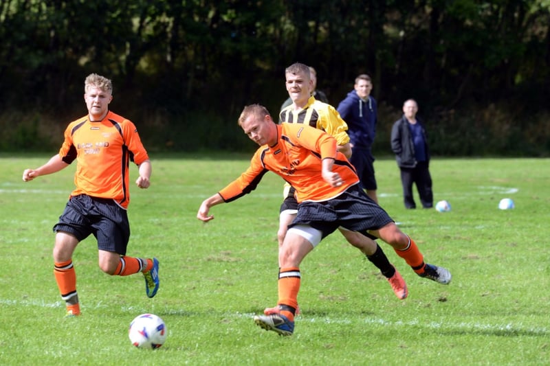 A midfield tussle in this 2013 match between Oddies in orange and Park View in yellow and black.
It took place at the Silksworth Sports Complex.