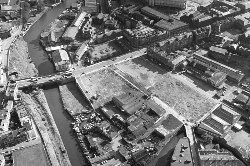 Aerial photo taken in 1979 of Great Junction Street in Leith where it crosses the Water of Leith looking east. Also in picture, Leith hospital (centre) and the Cables Wynd housing development (top)