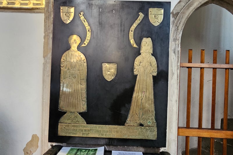 A brass in the upper church commemorates the lives of merchant Thomas Rowley (1478) burgess, bailiff, sheriff, and co-founder of the Brotherhood of the Holy Cross which is worshipped in the crypt and his wife Margaret Rowley who carried on trading after his death, and in 1480 she is recorded as shipping various goods from Flanders to Bristol.
