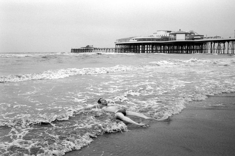 A determined bather battling against the cold weather on Blackpool beach in NOVMBER!