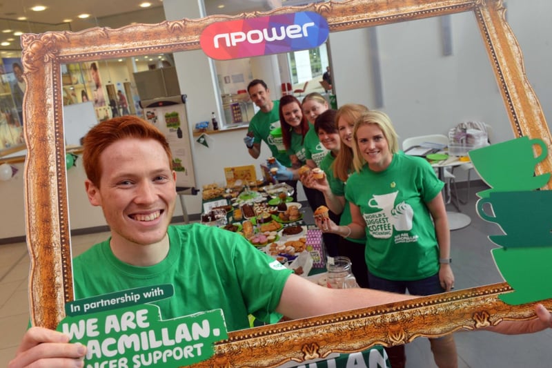 Bake Off star Andrew Smyth helped out at Npower's Macmillan's coffee morning event in 2017.