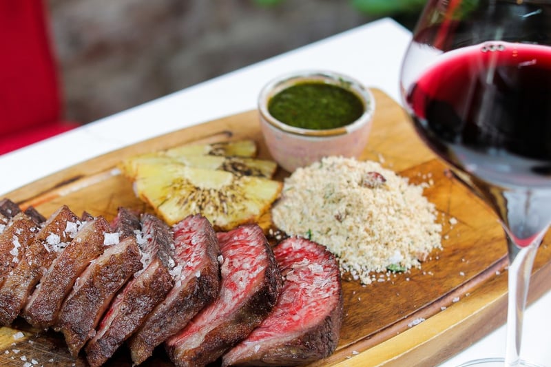 Enjoy a 400g Brazilian style Picanha Steak at El Santo which you can have on your own or to share. Meats are served with farofa, grilled pineapple and a sauce of your choice. 84 Miller St, Glasgow G1 1DT. 