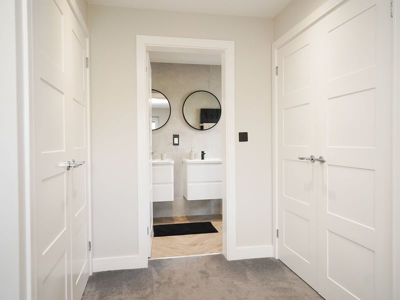 The first floor master suite features plenty of wardrobe and dressing space and a truly stunning, modern en-suite. (Photo courtesy of Redbrik)