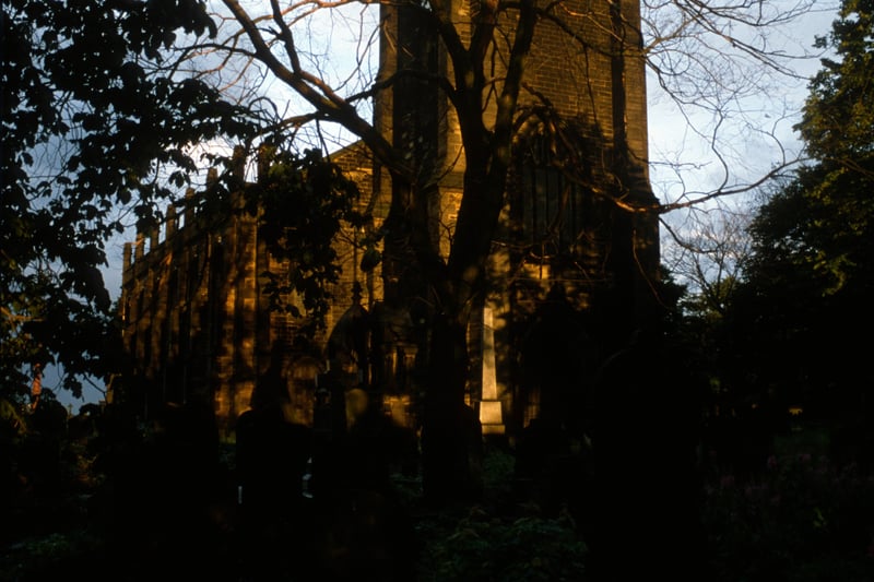 Looking through trees to St. Mark's C. of E. Church from St. Mark's Road in August 1985. It was built between 1823 and 1826 and was one of the 'million' churches built after the Battle of Waterloo when the Government committed £1 million for the building of new churches in populous urban areas.