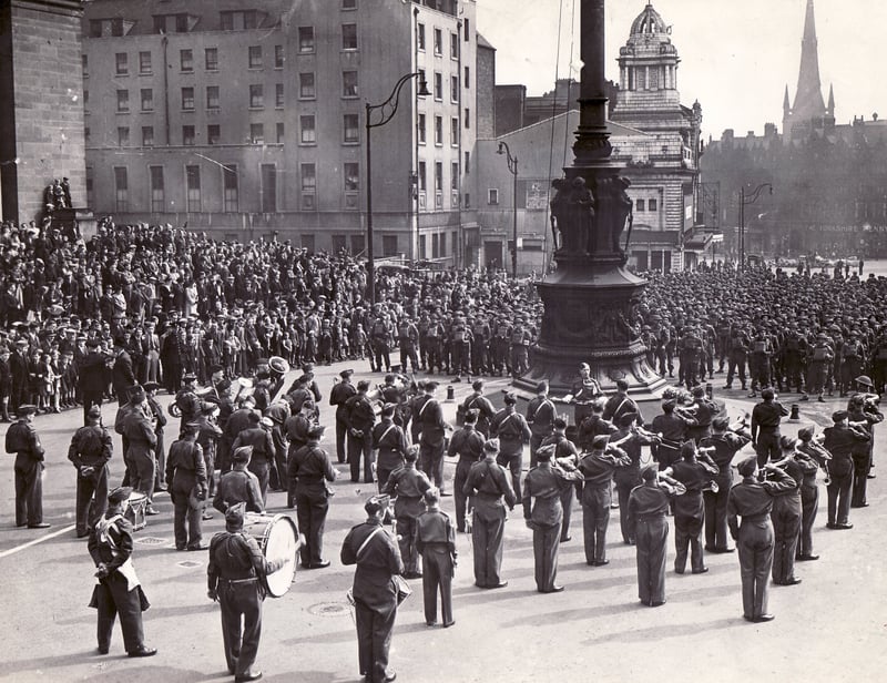 Members of the 69 (West Riding) Battalion of the Home Guard, commanded by Colonel W. Howson, with their band, drums and bugles, assembled in Barker's Pool, Sheffield, made an impressive picture with their machine-guns and sub-artillery weapons for an inspection and march past - party of the city's Home Guard Sunday celebrations - on May 17, 1943