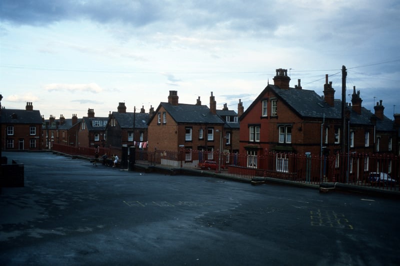 A view from the playground of Quarry Mount Primary School looking towards Cross Quarry Street in August 1985. Streets of terraced housing leading off are, from right, Bolland Street, Thomas Street, Quarry Place, Quarry Street and Christopher Road. Quarry Street continues on the far left while Cross Quarry Street becomes Glossop Street in the distance.