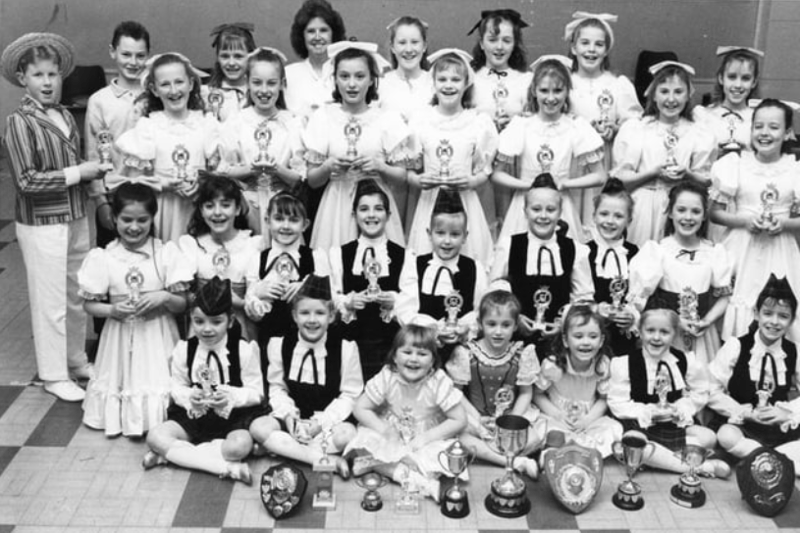 Members of the Valerie Shepherd School of Dancing with the trophies they won in a competition in March 1990. Does this bring back memories? 