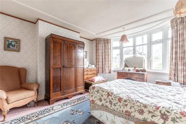 A second double bedroom sits to the front.