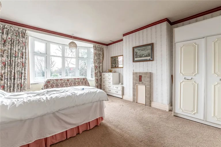 The large master bedroom benefits from a bay window and has tonnes of space for furniture.