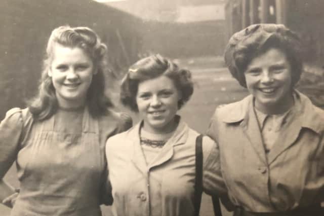 Violet (centre) with friends when she worked at Burdalls in Sheffield. 