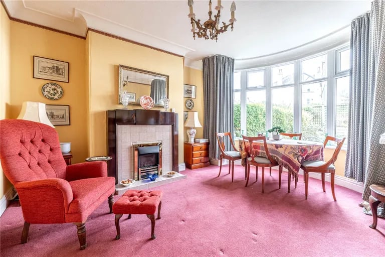 The separate dining room also benefits from a large circular bay window overlooking the front elevation.