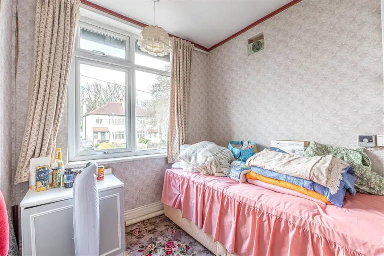 The third bedroom is a good-size single bedroom with window overlooking the front garden.