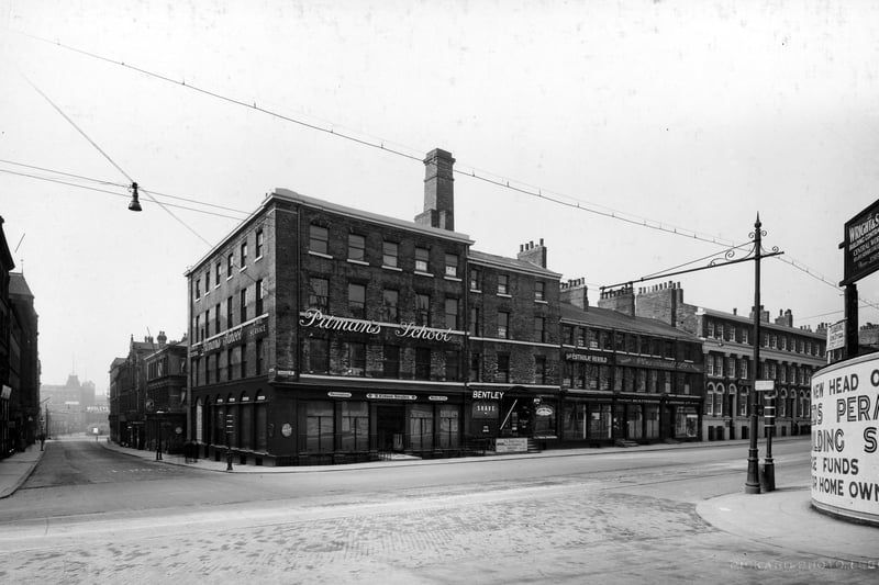 Looking from The Headrow on to the junction with Cookridge Street, Park Lane and Park Row. Isaac Pitman school of business and secretarial practices can be seen on the left. Pictured in October 1928.