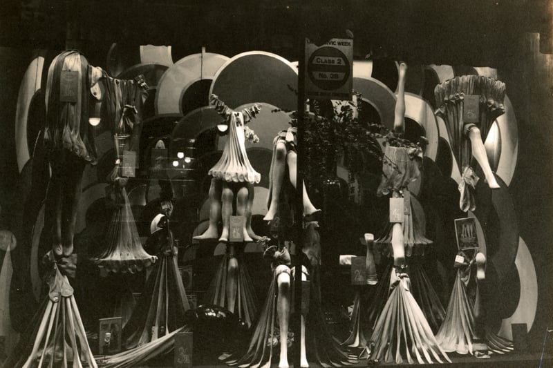 A photograph of a shop window display of ladies stockings in Hitchen's store for Leeds Civic Week in September 1928. 