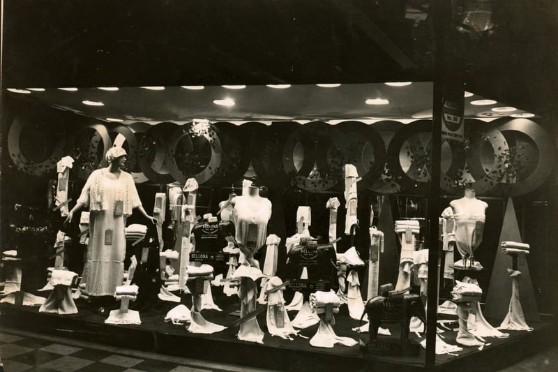 A photograph of a shop window display in Hitchen's store. The display won 2nd prize during Leeds Civic Week in September 1928. The display features undergarments manufactured by the brand Bellona (elephant trade mark).