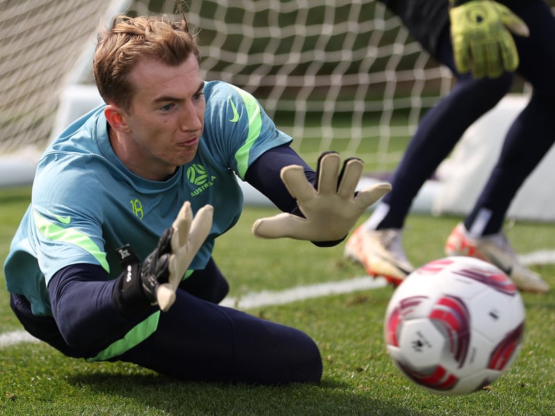 Deadline Day signing from Adelaide United. He's currently at the Asia Cup with Australia, and they play against South Korea on Friday, February 2 at 15.30 GMT. 

It's unlikely given the short space of time and the travelling involved that he would be on the bench on the Saturday. 