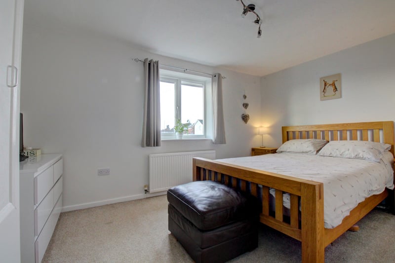 The master bedroom is a large double with fitted cupboard.